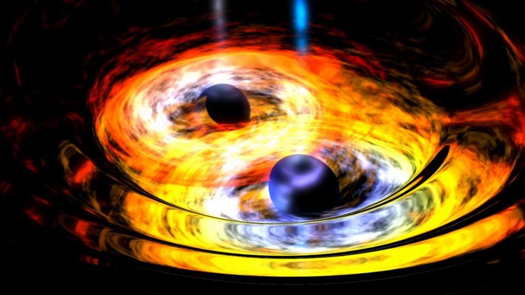 Bir gravitasyonel tangoda dolaşık iki karadeliğin temsil edilmesi. Galaksilerin kalbinde süperkütleli karadelikler daha küçük olanların birleştirilmesi yoluyla meydana geldiği düşünülmektedir. Image Credit: NASA